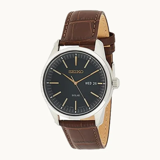 Reloj para hombre, esenciales, con calendario de día/fecha, manecillas y marcadores LumiBrite, pulsera de piel