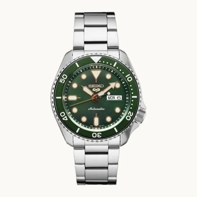 5 Sports - Reloj automático para hombre, calendario de día/fecha, manecillas e indicadores LumiBrite, bisel girato