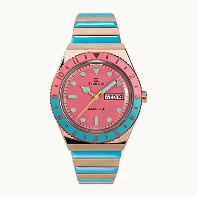 Q Malibu - Reloj para mujer de 36 mm, esfera negra con esfera dorada y correa de expansión de acero inoxidable en